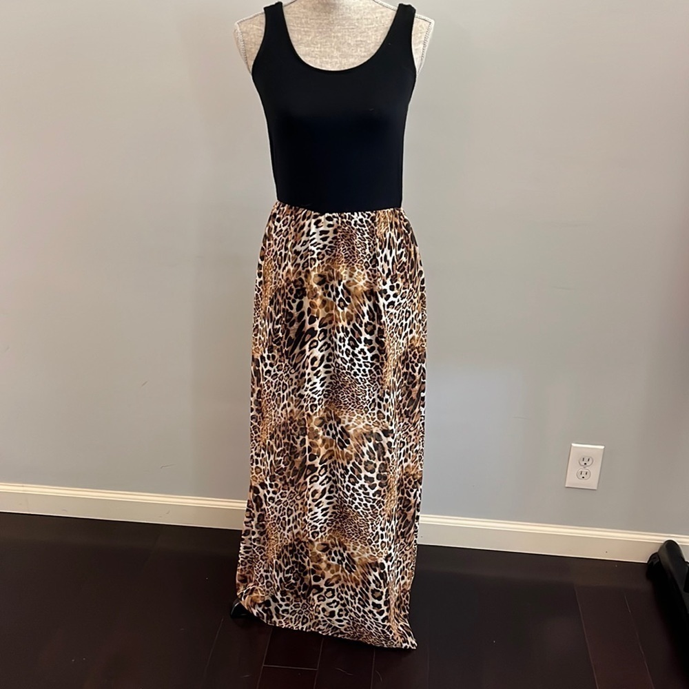 Charming Charlie maxi sleeveless dress black on top and leopard print on bottom.